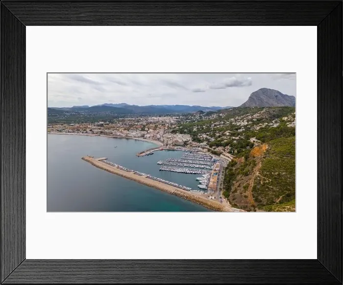 Framed Print : Aerial drone photo of the bay and coastal town of Xabia / Javea in the Costa Blanca, Spain Framed Print : Aerial drone photo of the bay and coastal town of Xabia / Javea in the Costa Blanca, Spain