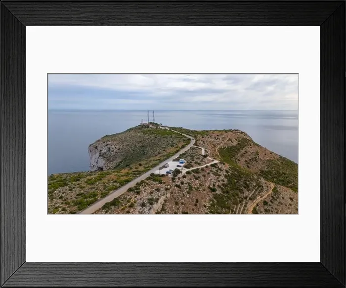 Framed Print : Aerial drone photo of the lighthouse on the cliffs of Cap de Sant Antoni Framed Print : Aerial drone photo of the lighthouse on the cliffs of Cap de Sant Antoni
