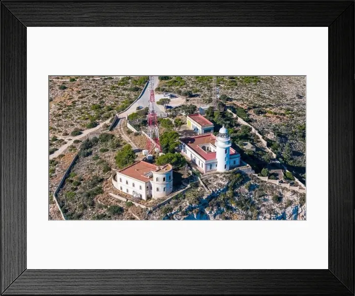 Framed Print : Aerial drone photo of the lighthouse on the cliffs of Cap de Sant Antoni Framed Print : Aerial drone photo of the lighthouse on the cliffs of Cap de Sant Antoni