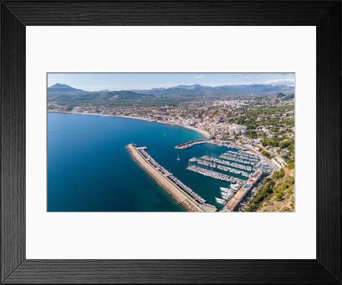 Framed Print : Aerial drone photo of the bay and coastal town of Xabia / Javea in the Costa Blanca, Spain Framed Print : Aerial drone photo of the bay and coastal town of Xabia / Javea in the Costa Blanca, Spain