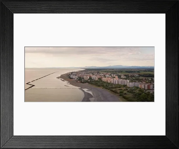 Framed Print : Drone shot of sandy beach with umbrellas and gazebos Framed Print : Drone shot of sandy beach with umbrellas and gazebos