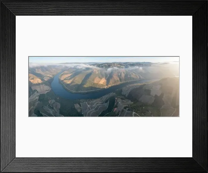Framed Print : Aerial view of the terraced vineyards in romantic sunset in the Douro Valley near the village of Pinhao