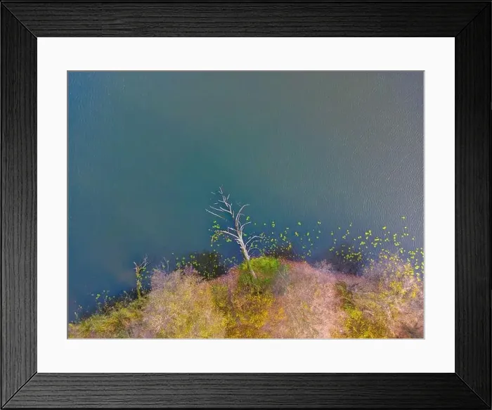 Framed Print : Aerial view of beautiful smooth green waters of a lake on a sunny autumn day Framed Print : Aerial view of beautiful smooth green waters of a lake on a sunny autumn day