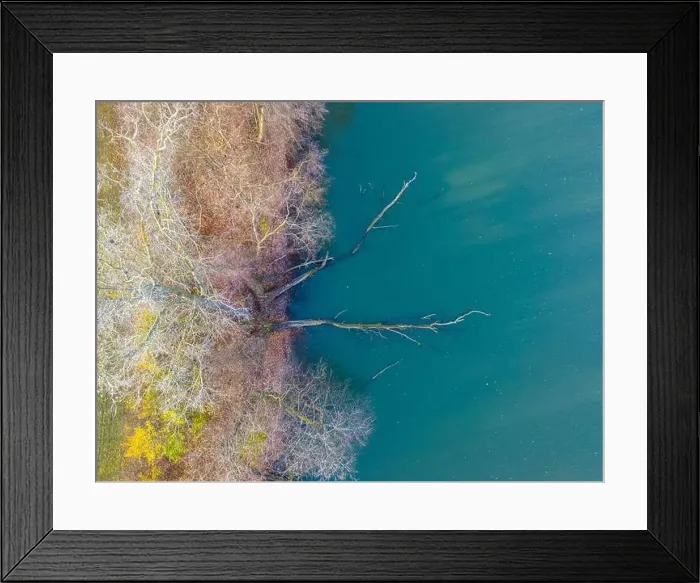 Framed Print : Aerial view of beautiful smooth green waters of a lake on a sunny autumn day Framed Print : Aerial view of beautiful smooth green waters of a lake on a sunny autumn day