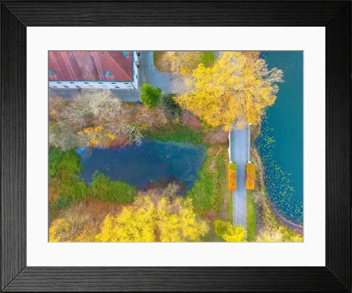 Framed Print : Beautiful travel or tourism style look down aerial of pedestrian foot bridge across River at park with colorful fall Framed Print : Beautiful travel or tourism style look down aerial of pedestrian foot bridge across River at park with colorful fall