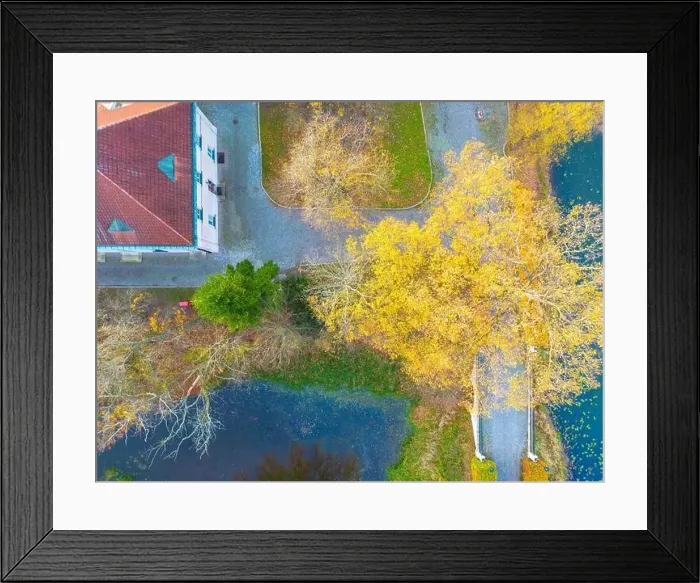 Framed Print : Beautiful travel or tourism style look down aerial of pedestrian foot bridge across River at park with colorful fall Framed Print : Beautiful travel or tourism style look down aerial of pedestrian foot bridge across River at park with colorful fall