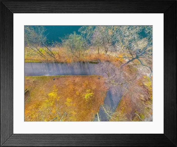 Framed Print : AERIAL forest in amazing autumn shades with road hiding under treetops Framed Print : AERIAL forest in amazing autumn shades with road hiding under treetops