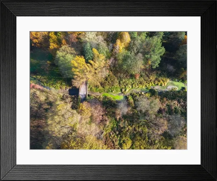 Framed Print : Aerial view of a rural road with in yellow and orange autumn forest Framed Print : Aerial view of a rural road with in yellow and orange autumn forest