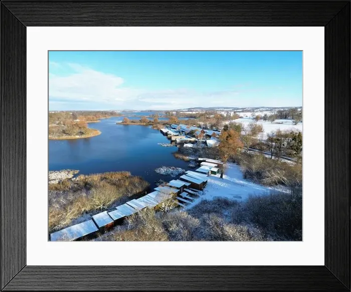 Framed Print : Boathouses at Lake Teterow in white winter Framed Print : Boathouses at Lake Teterow in white winter