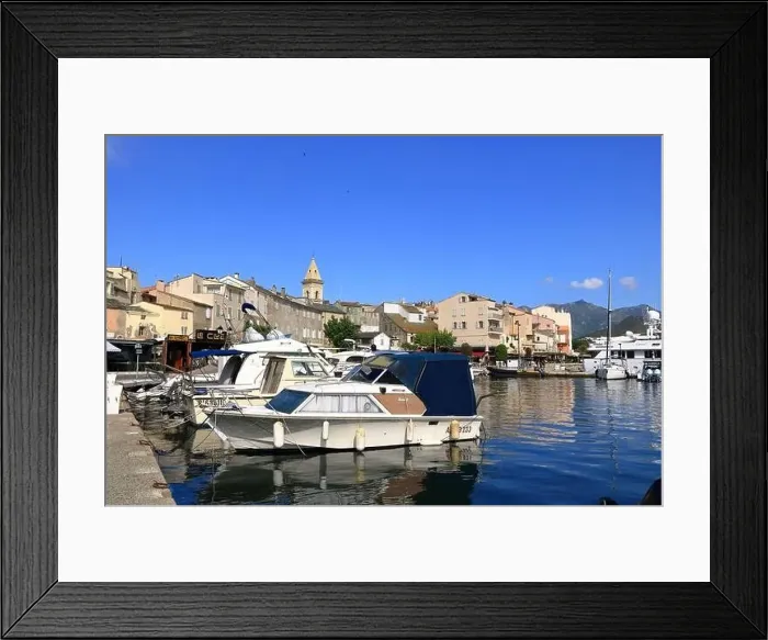 Framed Print : June 02 2023 - Saint-Florent, Corsica in France: pictorial old town port