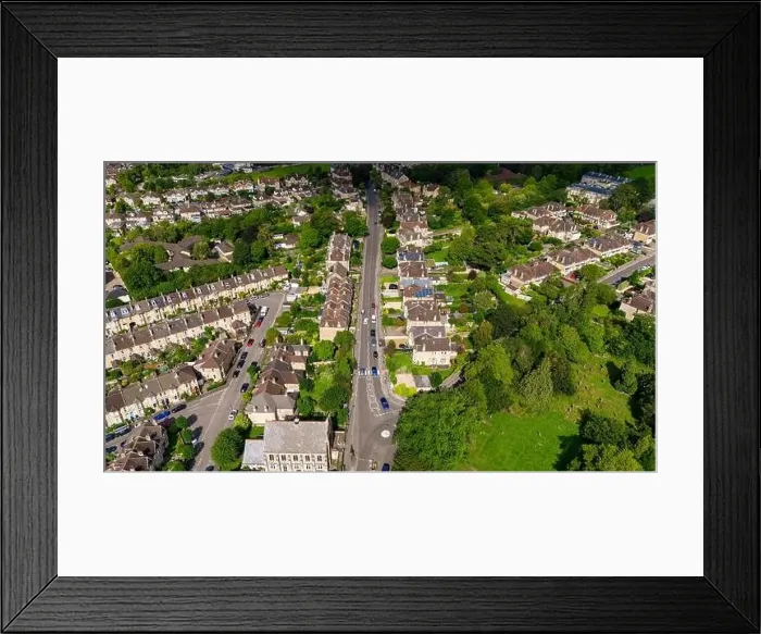 Framed Print : Aerial drone view looking up Newbridge Hill, heading out of the City of Bath, UK. (22-08-2023) Framed Print : Aerial drone view looking up Newbridge Hill, heading out of the City of Bath, UK. (22-08-2023)