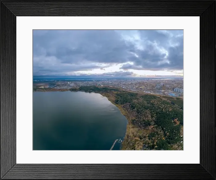 Framed Print : Autumn forest on lake shore at sunset and city on horizon, aerial view. Lake Shartash and Yekaterinburg, Russia Framed Print : Autumn forest on lake shore at sunset and city on horizon, aerial view. Lake Shartash and Yekaterinburg, Russia