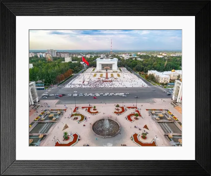 Framed Print : Bishkek, Kyrgyzstan - July 15, 2023: Aerial view of Bishkek city's Ala-Too central square with waving flag