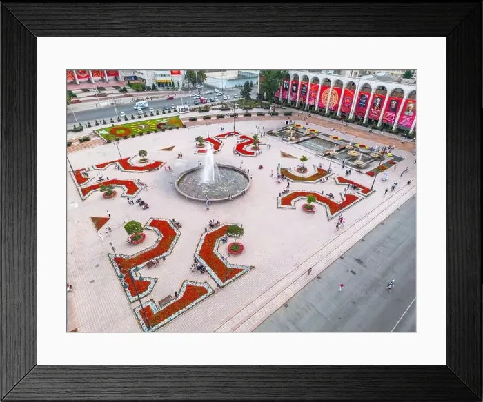 Framed Print : Bishkek, Kyrgyzstan - July 15, 2023: Aerial view of Bishkek city's Ala-Too central square with waving flag Framed Print : Bishkek, Kyrgyzstan - July 15, 2023: Aerial view of Bishkek city's Ala-Too central square with waving flag
