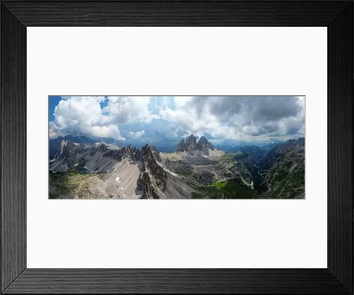 Framed Print : Aerial panoramic view of Tre Cime di Lavaredo mountain during a sunny day with clouds and fog in the Dolomites, Italy Framed Print : Aerial panoramic view of Tre Cime di Lavaredo mountain during a sunny day with clouds and fog in the Dolomites, Italy