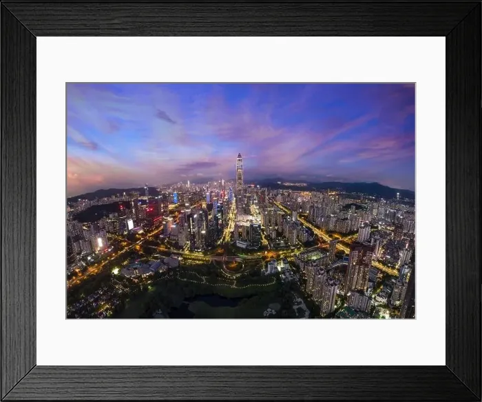Framed Print : Drone fly over Shenzhen city central business district, aerial panorama China at night Framed Print : Drone fly over Shenzhen city central business district, aerial panorama China at night