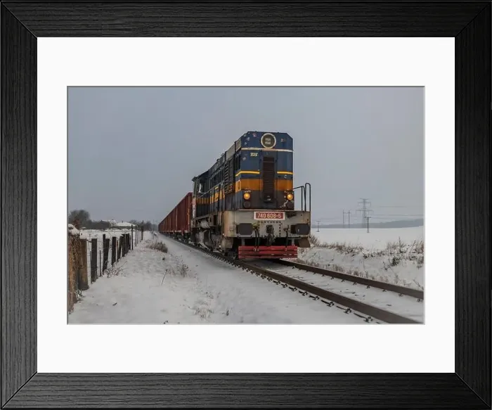 Framed Print : Cargo train with motor engine in winter snowy morning near cold village Lenesice CZ 12 09 2023 Framed Print : Cargo train with motor engine in winter snowy morning near cold village Lenesice CZ 12 09 2023