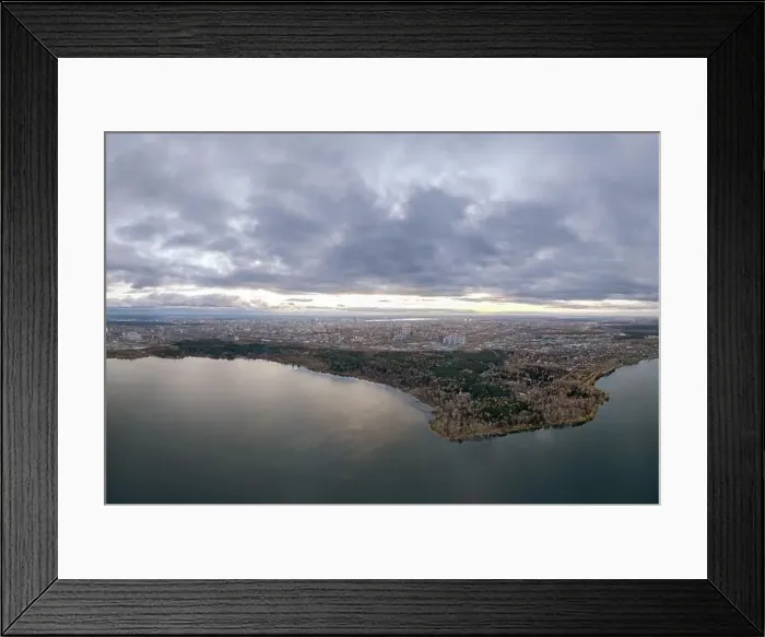 Framed Print : Autumn forest on lake shore at sunset and city on horizon, aerial view. Lake Shartash and Yekaterinburg, Russia Framed Print : Autumn forest on lake shore at sunset and city on horizon, aerial view. Lake Shartash and Yekaterinburg, Russia