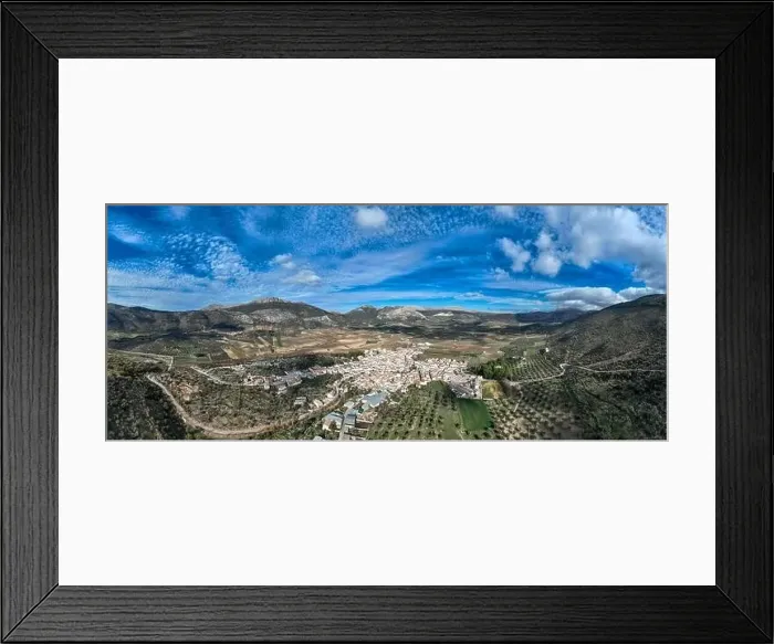 Framed Print : aerial view of the pretty white village of Alfarnate in the province of Malaga, Spain Framed Print : aerial view of the pretty white village of Alfarnate in the province of Malaga, Spain