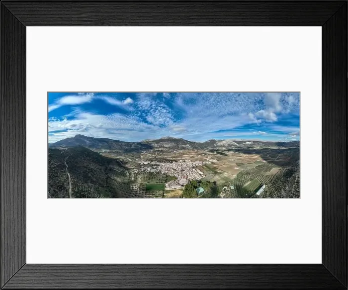 Framed Print : aerial view of the pretty white village of Alfarnate in the province of Malaga, Spain Framed Print : aerial view of the pretty white village of Alfarnate in the province of Malaga, Spain