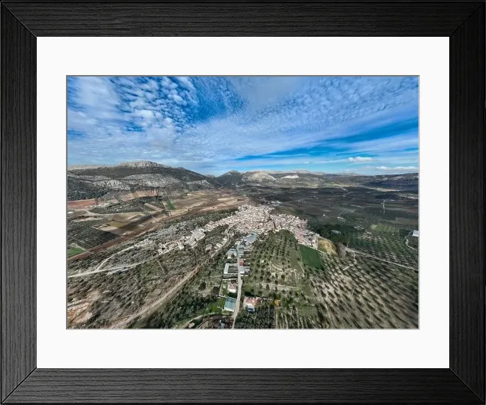 Framed Print : aerial view of the pretty white village of Alfarnate in the province of Malaga, Spain Framed Print : aerial view of the pretty white village of Alfarnate in the province of Malaga, Spain