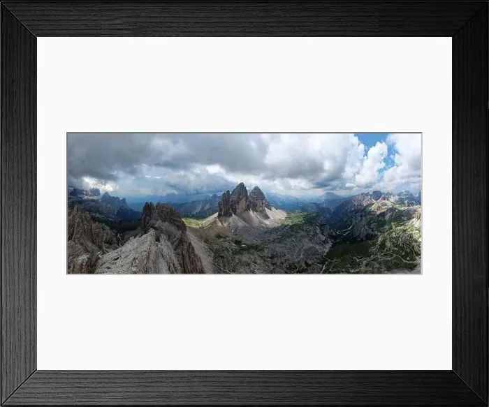 Framed Print : Aerial panoramic view of Tre Cime di Lavaredo mountain during a sunny day with clouds and fog in the Dolomites, Italy Framed Print : Aerial panoramic view of Tre Cime di Lavaredo mountain during a sunny day with clouds and fog in the Dolomites, Italy
