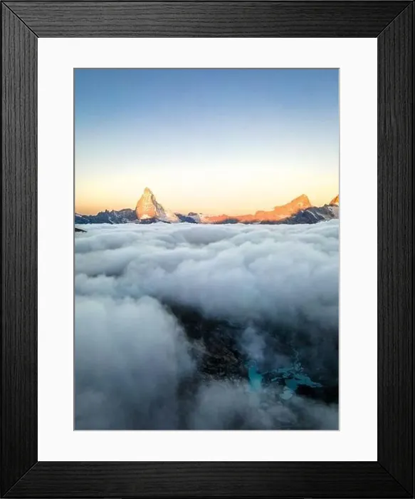Framed Print : Sunrise at Matterhorn, Switzerland. Aerial photo taken with a drone. Mountain above the clouds