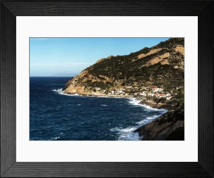 Framed Print : A view of the small hamlet of Chiessi on the rugged west coast of Elba Island Framed Print : A view of the small hamlet of Chiessi on the rugged west coast of Elba Island