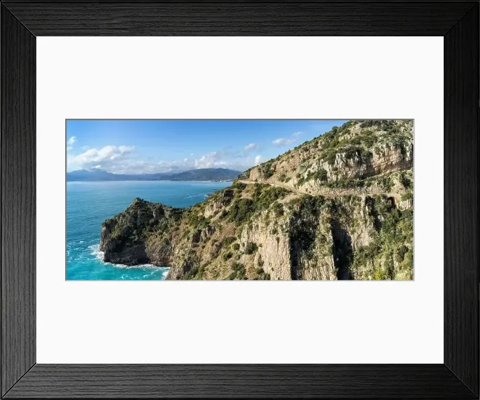 Framed Print : A landscape view of the Costa di Maratea with a narrow and winding coastal highway in the cliffside Framed Print : A landscape view of the Costa di Maratea with a narrow and winding coastal highway in the cliffside