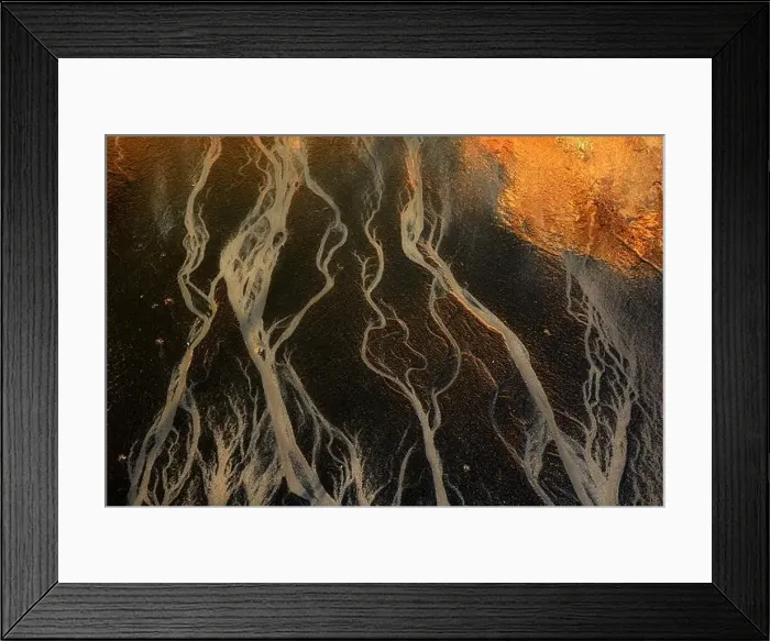 Framed Print : An aerial shot captures the intriguing patterns of a river delta Framed Print : An aerial shot captures the intriguing patterns of a river delta