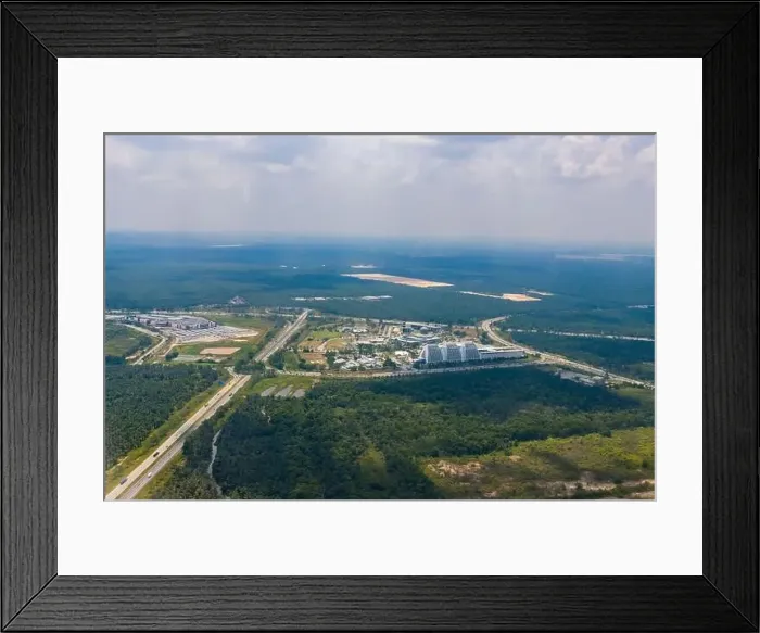 Framed Print : Green Ariel Landscape with Buildings in city of Kuala Lumpur, Malaysia captured from drone Framed Print : Green Ariel Landscape with Buildings in city of Kuala Lumpur, Malaysia captured from drone