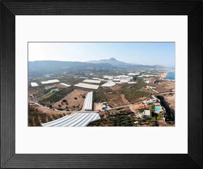 Framed Print : Crete island Greece. Aerial drone panoramic view of greenhouse in valley Framed Print : Crete island Greece. Aerial drone panoramic view of greenhouse in valley