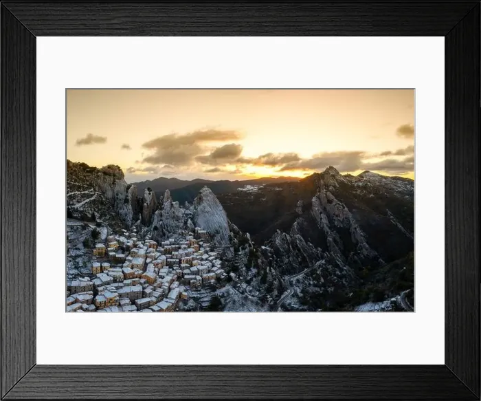 Framed Print : A drone view of Castelmezzano at sunrise in winter Framed Print : A drone view of Castelmezzano at sunrise in winter