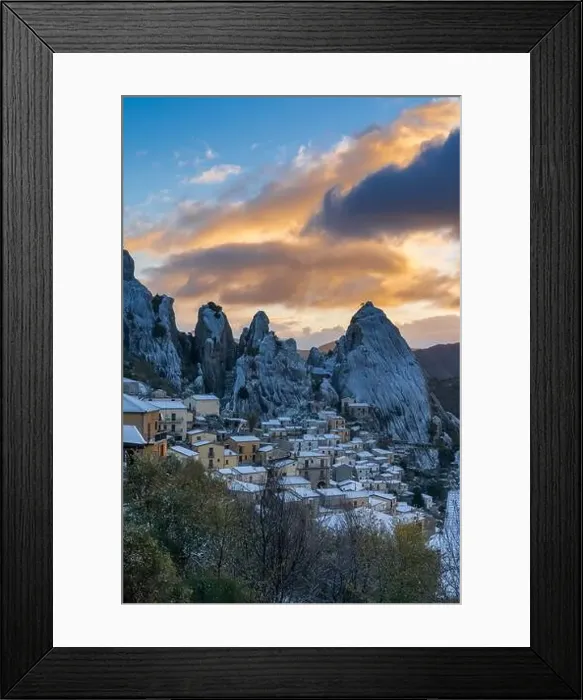 Framed Print : Vertical view of Castlemzzano village in winter with a colourful sunrise sky above Framed Print : Vertical view of Castlemzzano village in winter with a colourful sunrise sky above