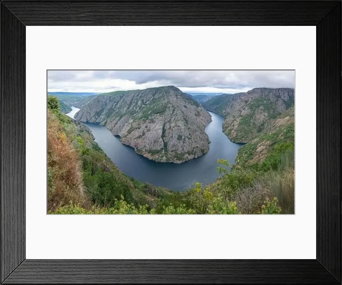 Framed Print : Aerial view of majestic rocky mountains and river at Cies Island in Galicia Framed Print : Aerial view of majestic rocky mountains and river at Cies Island in Galicia