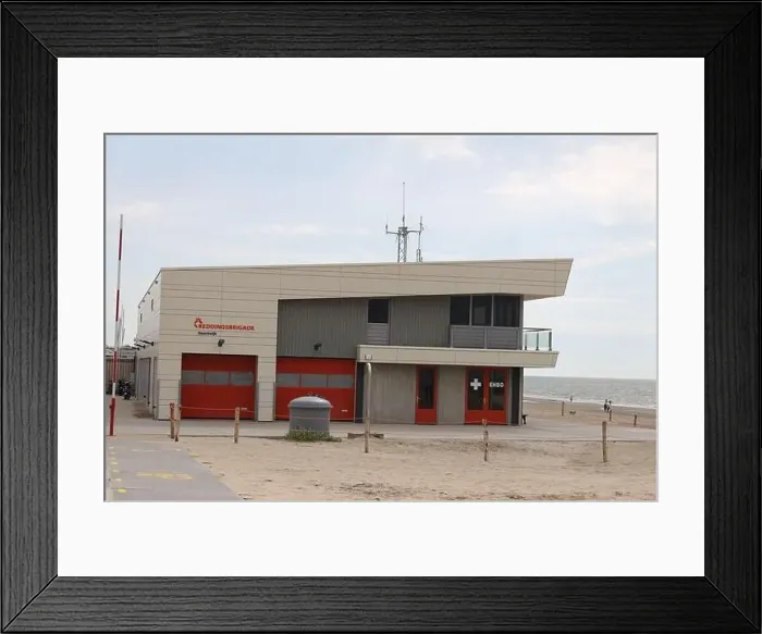 Framed Print : Building of the baywatch (reddingsbrigade in dutch) at the North Sea coast of Noordwijk in the Netherlands Framed Print : Building of the baywatch (reddingsbrigade in dutch) at the North Sea coast of Noordwijk in the Netherlands