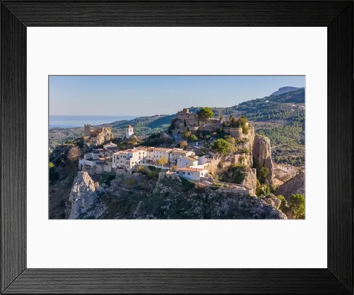 Framed Print : Aerial drone photo of the Spanish mountain town named El Castell de Guadalest Framed Print : Aerial drone photo of the Spanish mountain town named El Castell de Guadalest