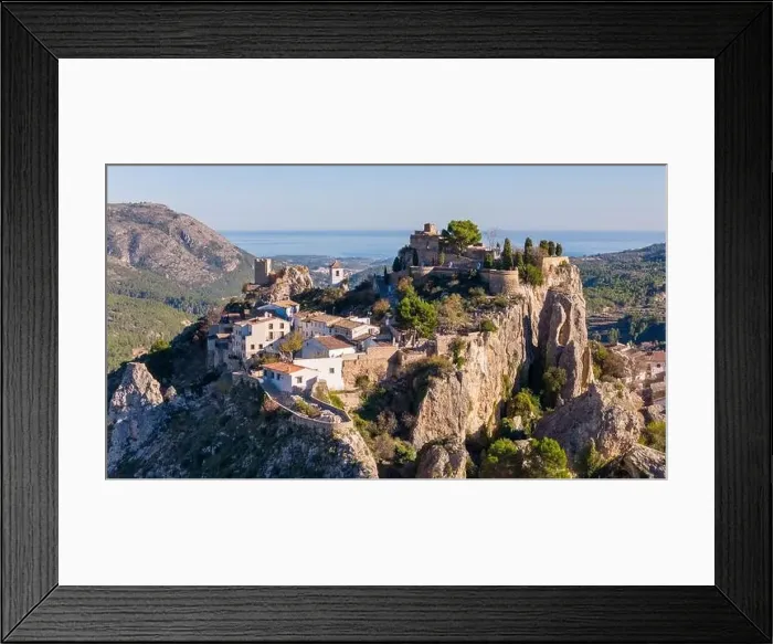Framed Print : Aerial drone photo of the Spanish mountain town named El Castell de Guadalest Framed Print : Aerial drone photo of the Spanish mountain town named El Castell de Guadalest
