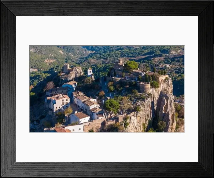Framed Print : Aerial drone photo of the Spanish mountain town named El Castell de Guadalest Framed Print : Aerial drone photo of the Spanish mountain town named El Castell de Guadalest