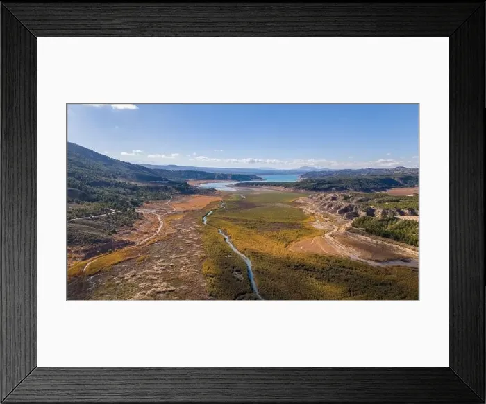 Framed Print : Aerial drone photo of the lake Negratin and the hot springs which are located in the Granada Geopark, Spain Framed Print : Aerial drone photo of the lake Negratin and the hot springs which are located in the Granada Geopark, Spain