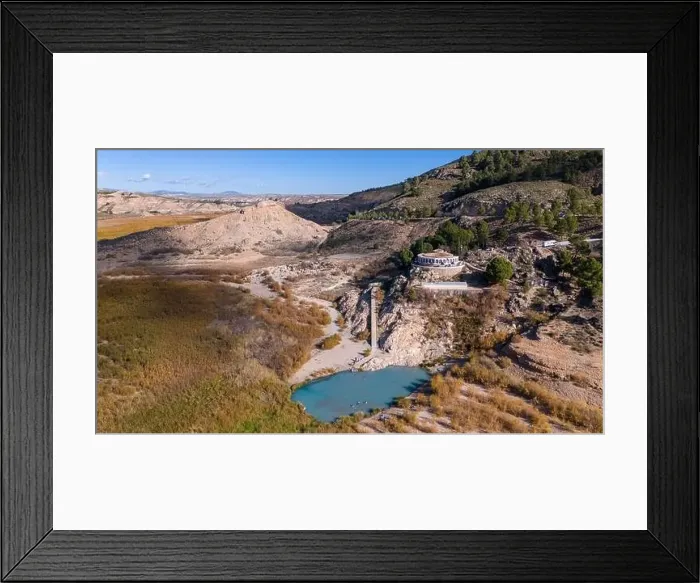 Framed Print : Aerial drone photo of the lake Negratin and the hot springs which are located in the Granada Geopark, Spain Framed Print : Aerial drone photo of the lake Negratin and the hot springs which are located in the Granada Geopark, Spain
