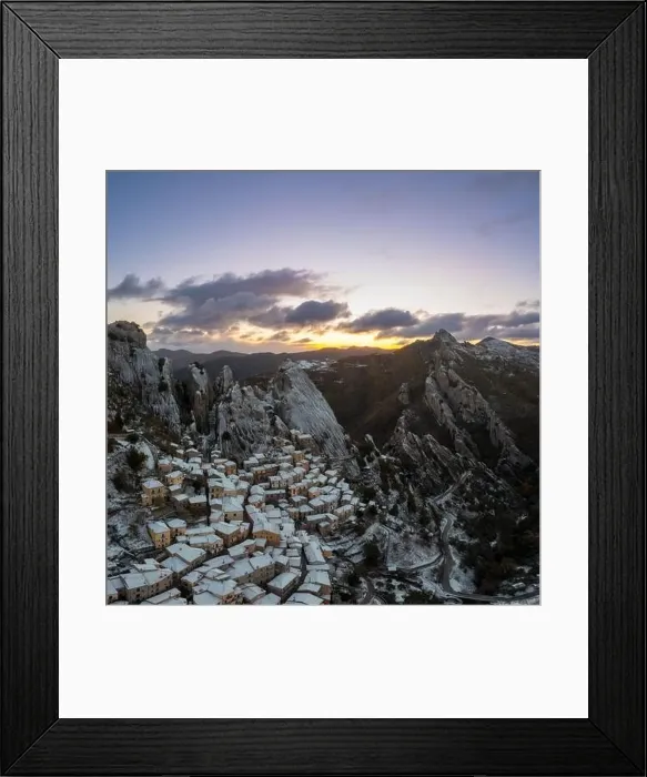Framed Print : A drone view of Castelmezzano at sunrise in winter Framed Print : A drone view of Castelmezzano at sunrise in winter