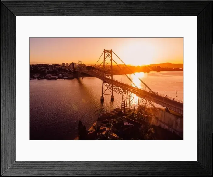 Framed Print : Hercilio luz cable bridge with sunset in Florianopolis, Brazil. Aerial view Framed Print : Hercilio luz cable bridge with sunset in Florianopolis, Brazil. Aerial view