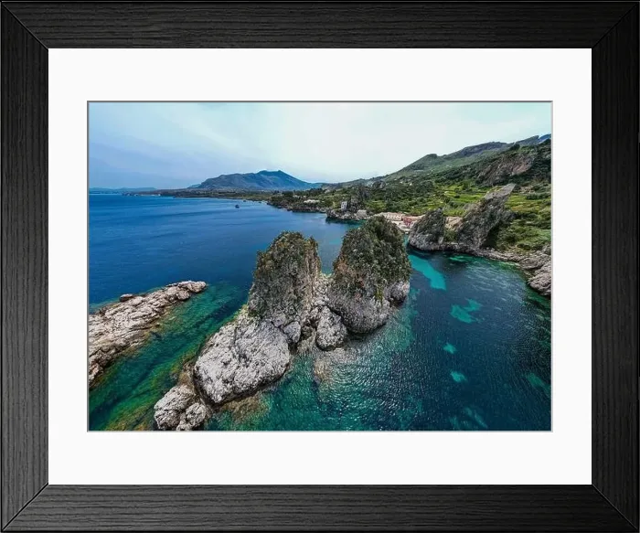 Framed Print : Sicily 2023. Aerial view of the sea stacks of Scopello and the crystalline sea Framed Print : Sicily 2023. Aerial view of the sea stacks of Scopello and the crystalline sea