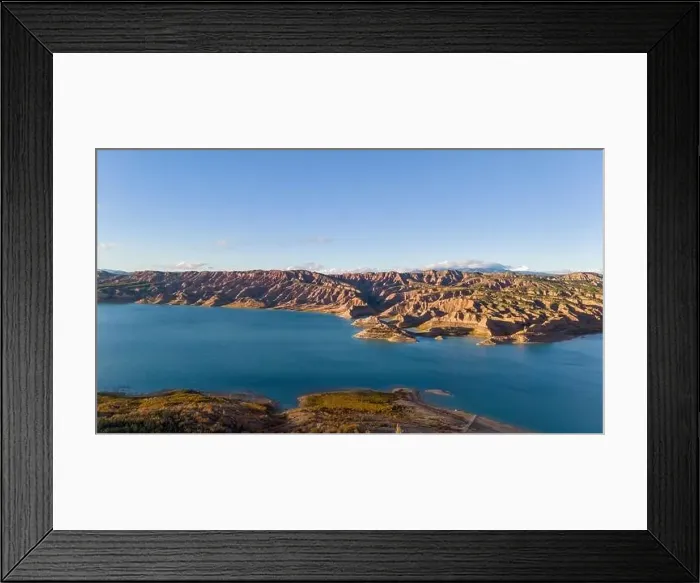 Framed Print : This aerial drone photo shows the lake Negratin in the Granada Geopark, Spain Framed Print : This aerial drone photo shows the lake Negratin in the Granada Geopark, Spain