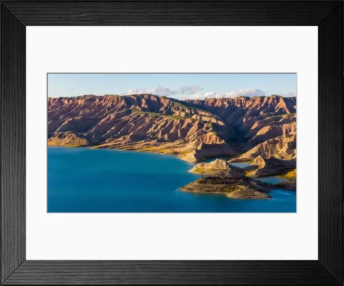 Framed Print : This aerial drone photo shows the lake Negratin in the Granada Geopark, Spain Framed Print : This aerial drone photo shows the lake Negratin in the Granada Geopark, Spain