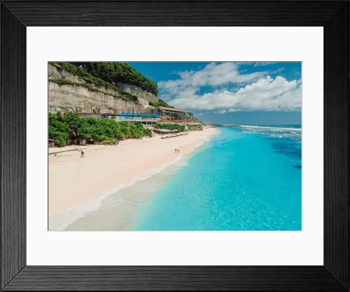 Framed Print : Paradise holiday beach with turquoise ocean and beach club in Bali. Aerial view Framed Print : Paradise holiday beach with turquoise ocean and beach club in Bali. Aerial view