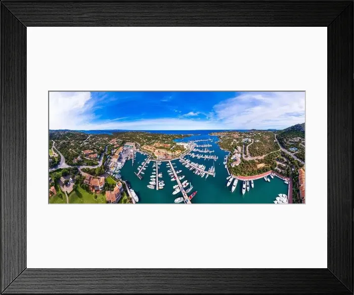 Framed Print : Italy, Sardegna island. Luxury resort town Porto Cervo. Marina with sailing boats, aerial drone video view Framed Print : Italy, Sardegna island. Luxury resort town Porto Cervo. Marina with sailing boats, aerial drone video view