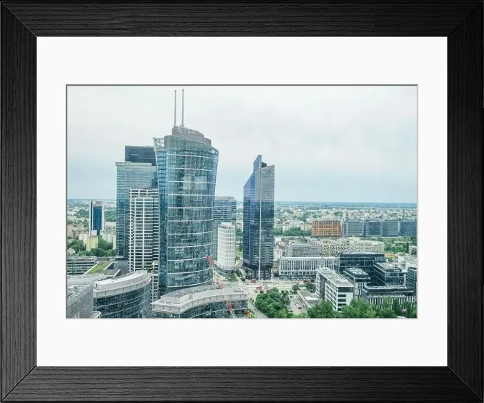 Framed Print : Bird's eye view Warsaw's towering skyscrapers. May 27, 2022. Warsaw, Poland Framed Print : Bird's eye view Warsaw's towering skyscrapers. May 27, 2022. Warsaw, Poland