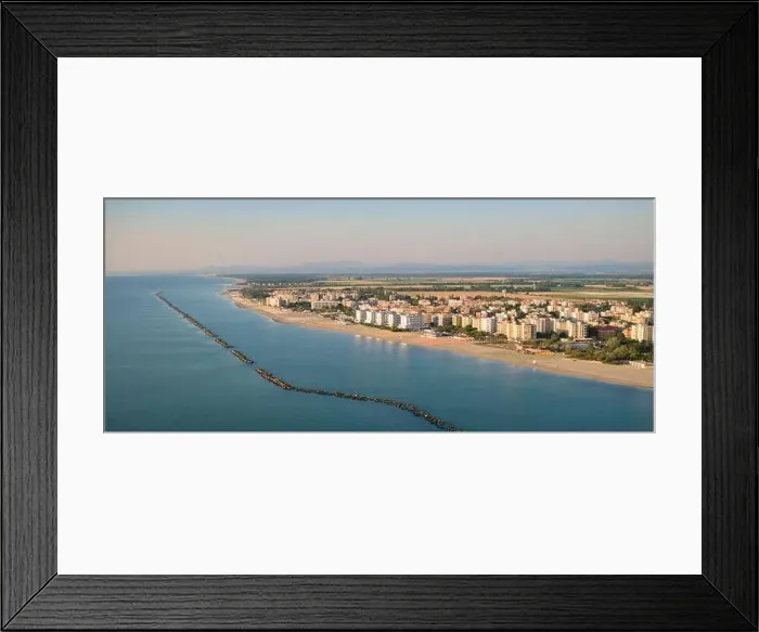Framed Print : Drone shot of Adriatic shoreline.Summer vacation concept.Lido Adriano town, Adriatic coast, Emilia Romagna, Italy Framed Print : Drone shot of Adriatic shoreline.Summer vacation concept.Lido Adriano town, Adriatic coast, Emilia Romagna, Italy